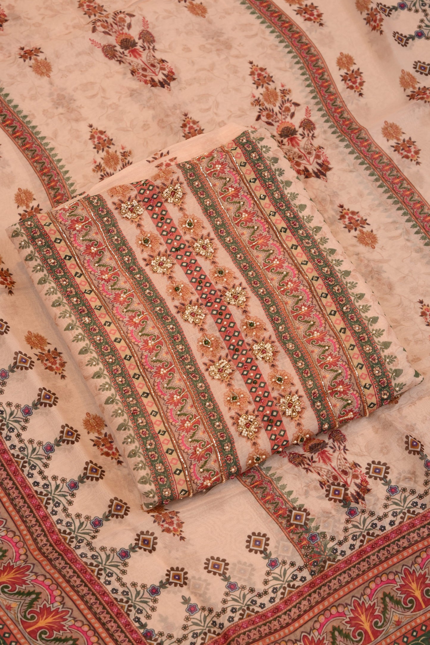 Soft Peach Traditional Printed Suit with Designer Borders dupatta