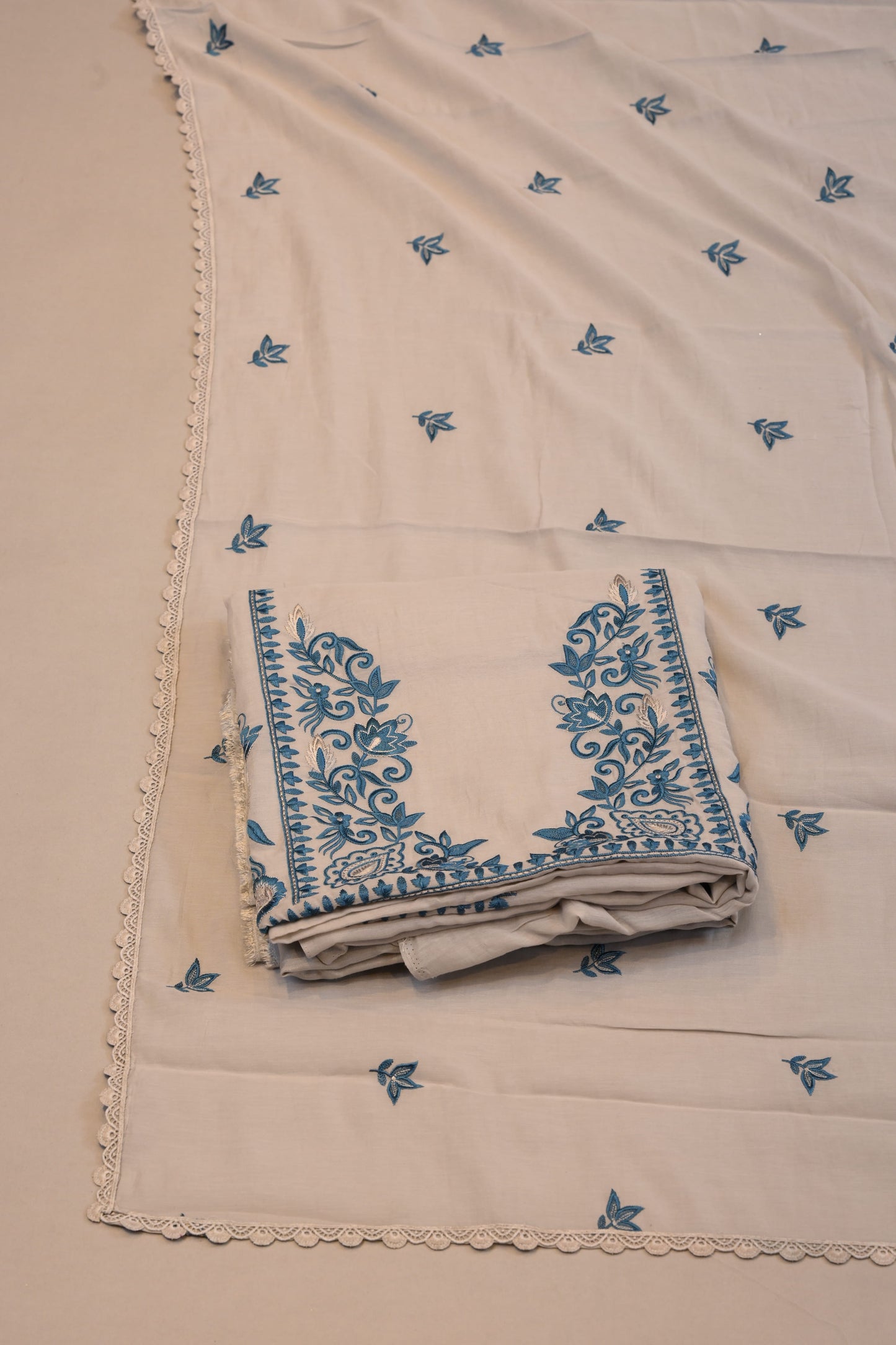Elegant White Suit with Blue Floral Embroidery & Lace Border Dupatta
